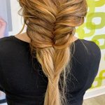 woman with large braid in hair