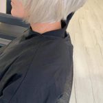 woman with short blonde pixie crop haircut